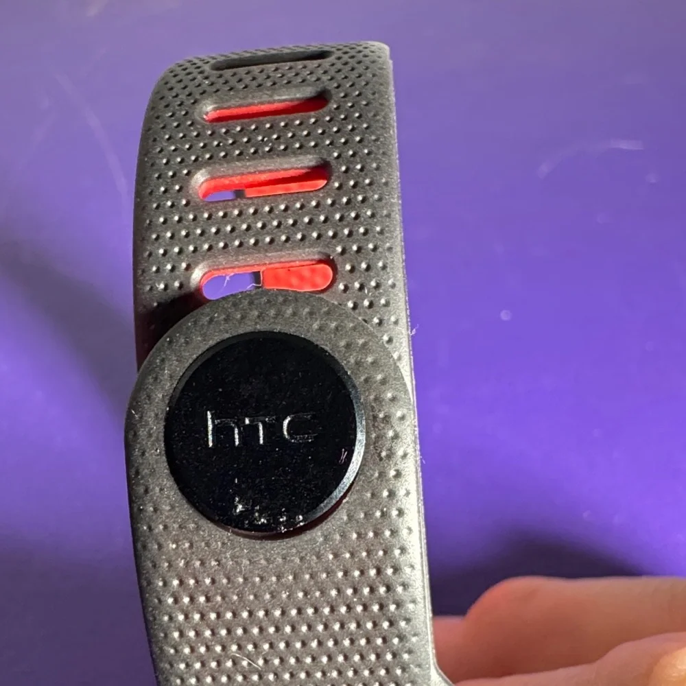 Under Armour htc Activity Tracker wrist band. Black and red, untested.
